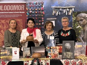 NHEC members Irka Balan, teacher Orysya Petryshyn, Valentina Kuryliw and NHEC member Valentina Noseworthy at the Holodomor Education and Awareness Resource table, MSSTA 20 OCT 2023